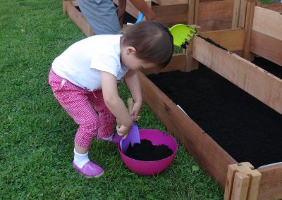 little ones helping to plant the garden
